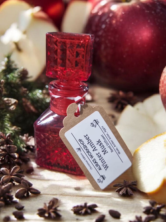 🎄 Winter Amber Musk Reed Diffuser – Christmas Edition (Red Bottle, 50ml) - Auras Workshop Auras Workshop